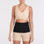 Marena Recovery style AB3 abdominal binder front view, show in black on female model.