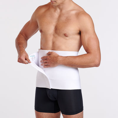 Marena Recovery style AB4F7 abdominal binder shown from the front with male model opening the binder.