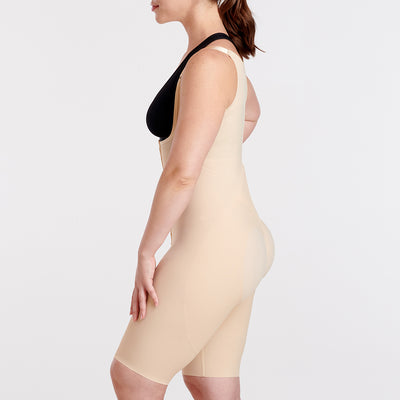 Marena Recovery style FBCS short-length compression BBL bodysuit side view in beige.
