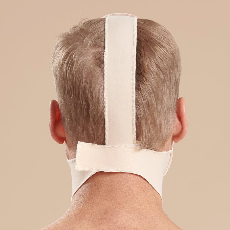 Marena Recovery style FM100-B minimal coverage, mid neck length compression face mask, side view in beige shown on female model.