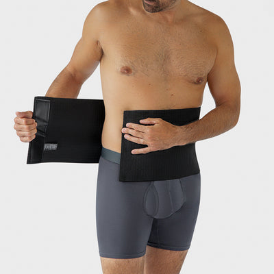 Marena Recovery style AICAB09 abdominal binder front detail view, shown in black on male model.