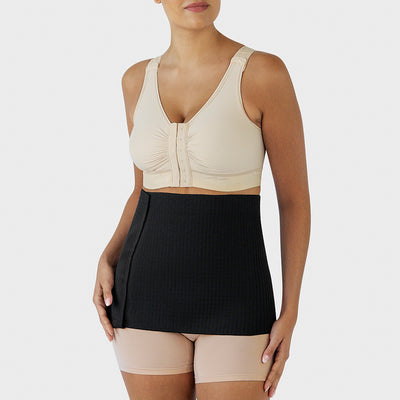 Marena Recovery style AICAB12 abdominal binder front view, shown in black on female model.