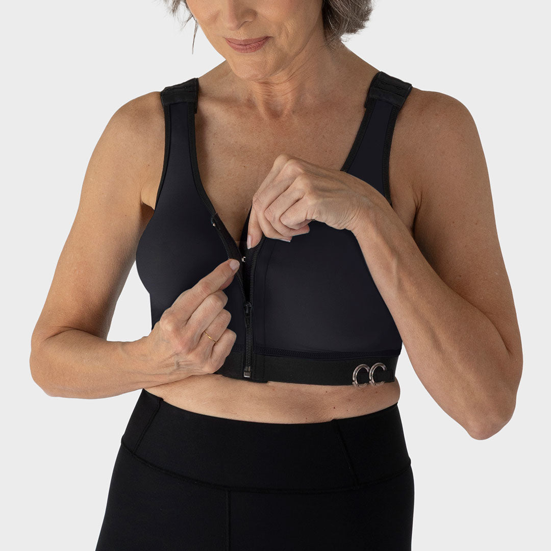 Caress Ultra-Soft Drain Bulb Management Zip-Front Surgical Bra, front closure detail view in black