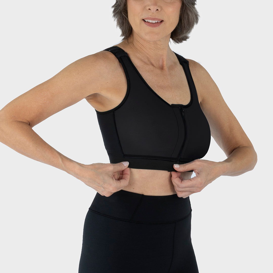 Style Name: Caress Ultra-Soft Zip-Front Surgical Bra, side view in black