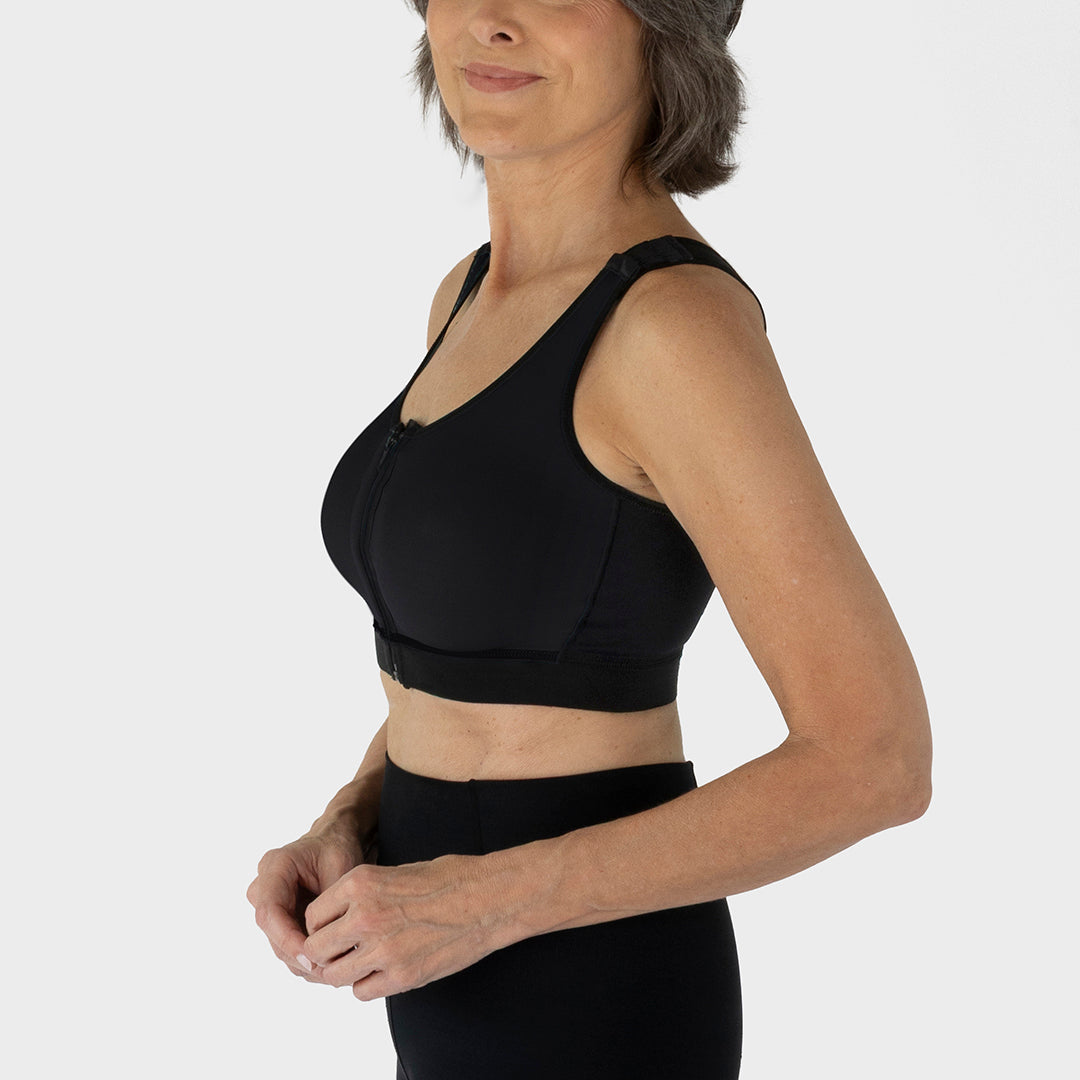 Style Name: Caress Ultra-Soft Zip-Front Surgical Bra, side view in black