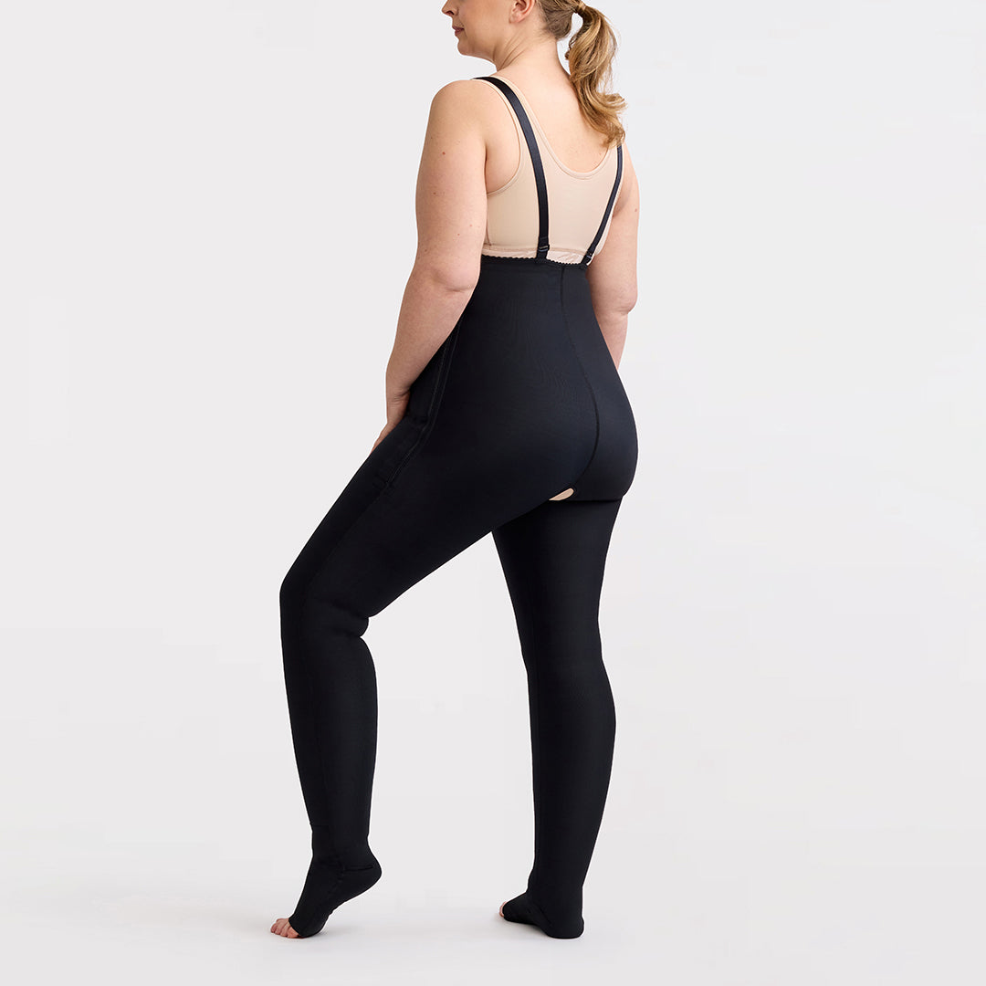 Marena Recovery style LIPSGHE, Lipedema Post-Surgical Girdle with Hook-&-Eye in black, shown from the side on a female model.