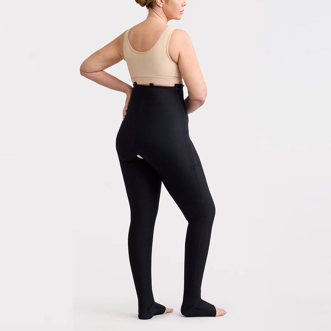 Marena Recovery style LIPSGHE, Lipedema Post-Surgical Girdle with Hook-&-Eye in black, shown from the side on a female model.
