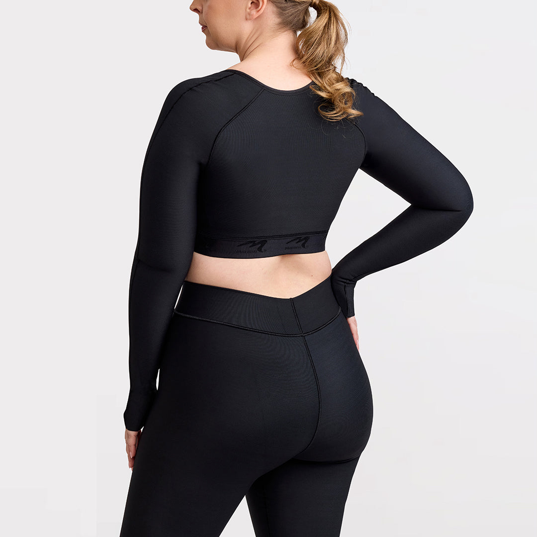 Marena Recovery style LIVOLH Lipedema Post-Surgical Open Bust Vest With Hand Coverage, in black, back view shown on a female model.