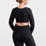 Marena Recovery style LIVOLH Lipedema Post-Surgical Open Bust Vest With Hand Coverage, in black, back view shown on a female model.