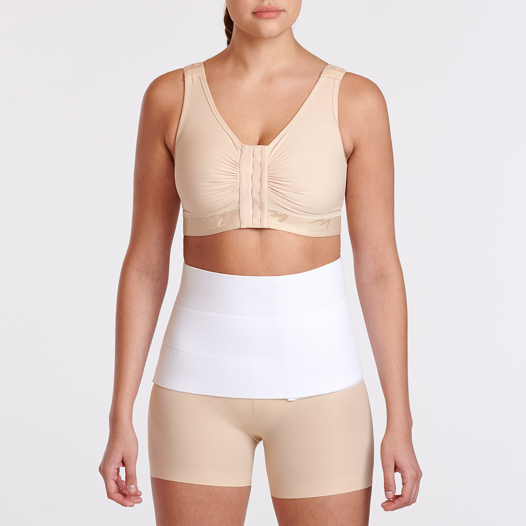 Marena Recovery style AB3F7 abdominal binder front view, shown on female model with velcro closure and inner fabric.