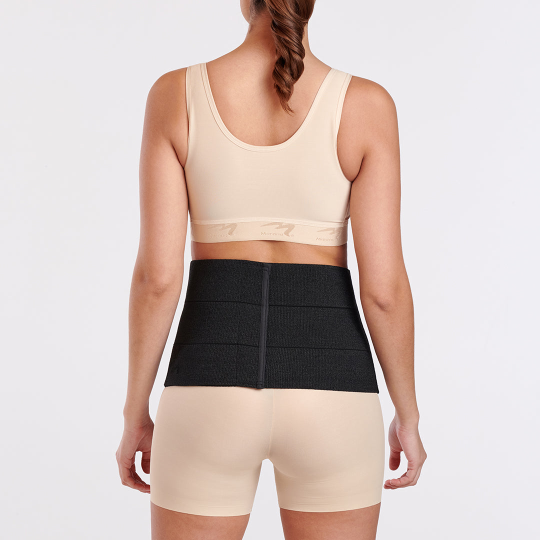 Marena Recovery style AB3 abdominal binder back view, show in black on female model.