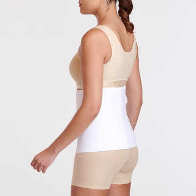 Marena Recovery style AB4F7 abdominal binder shown from the side with female model.