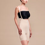 Marena Recovery style FBT compression girdle with suspenders thigh length, side pose view in beige
