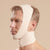 Marena Recovery style FM100-C minimal coverage, full neck length compression face mask side view in beige shown on male model