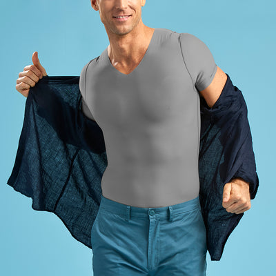 Marena Shape style ME-1001 Short sleeve compression v-neck , front pose view in grey fabric worn under navy button up shirt and blue pants