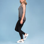 Marena Shape style ME-621 High-waist compression legging side pose, in black worn with grey tank top and sneakers