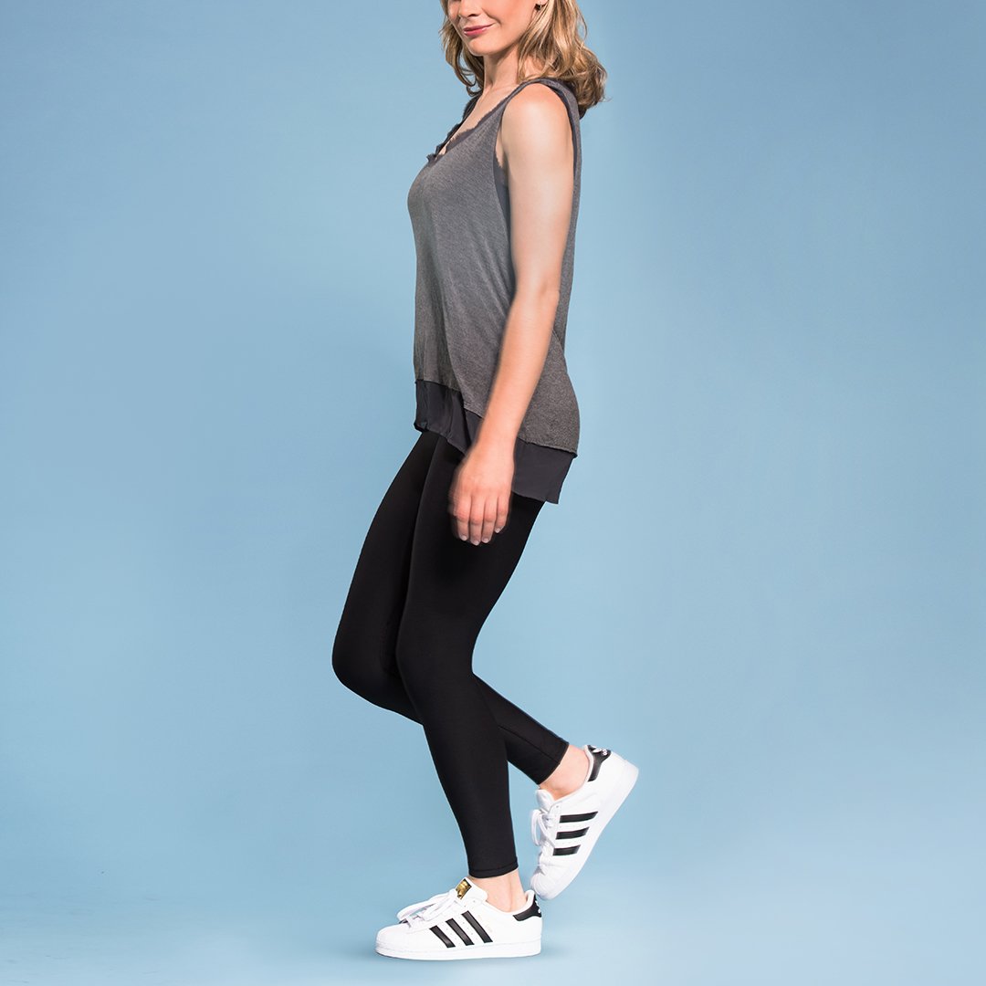 Marena Shape style ME-621 High-waist compression legging side pose, in black worn with grey tank top and sneakers
